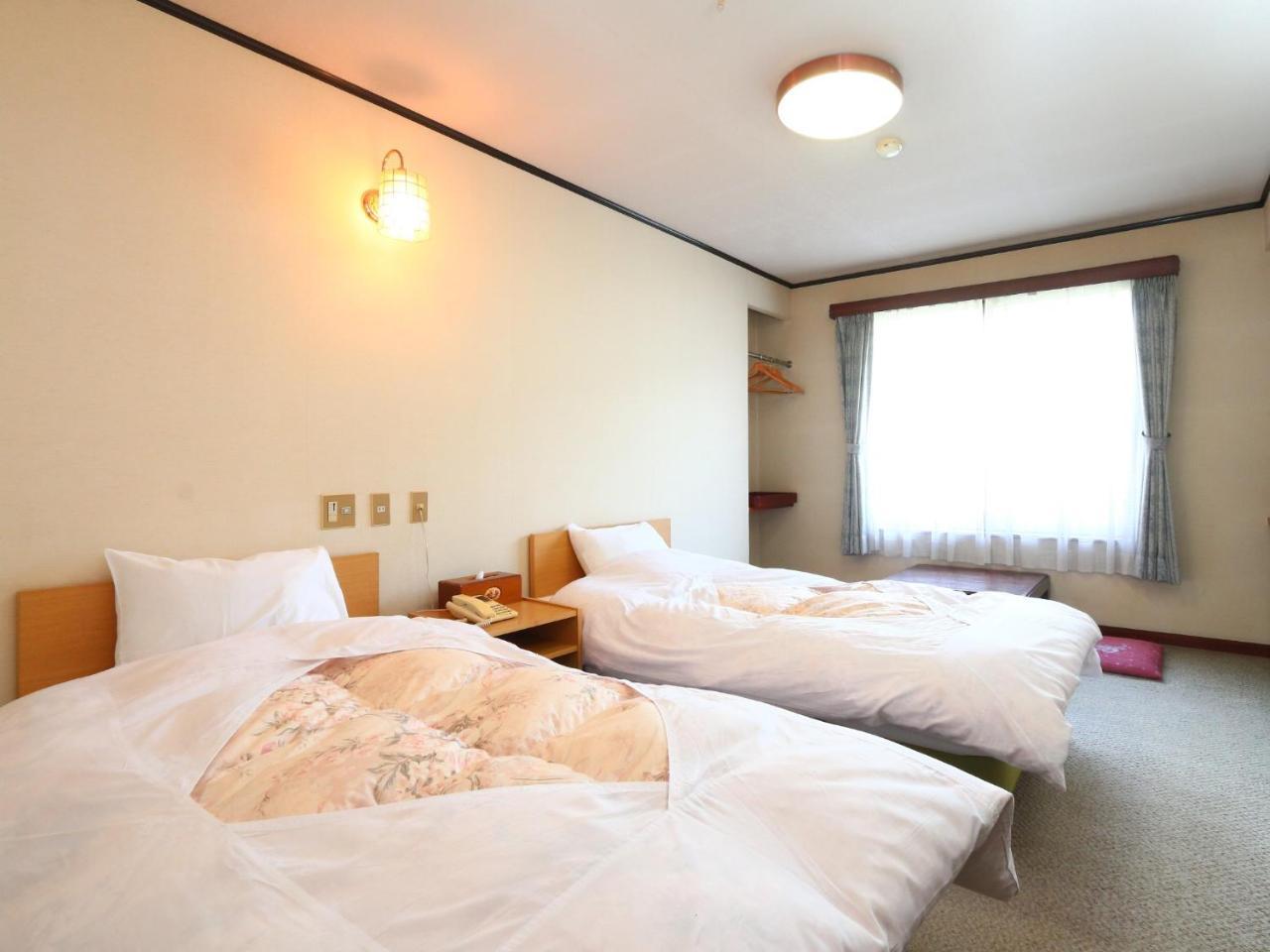 Hotel Ikemoto Nozawaonsen Esterno foto